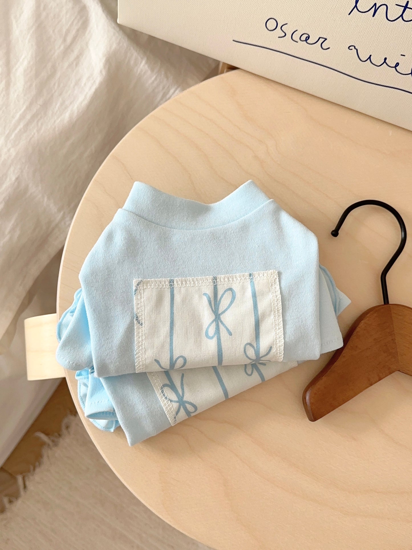 Detail of ruffle hem on soft cotton pet tee