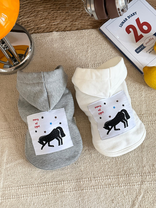 Gray and white sleeveless dog hoodie flat lay, 100% cotton with cotton fleece lining, pony illustration
